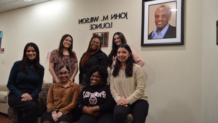 Photo showing a group outside of the office of diversity, equity, and inclusion